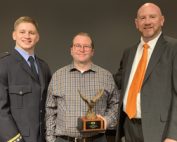 Hunter Poston, Patrick Cody, and Kelly McCauley pose for a photo after the OKAMA Stars of Life Banquet in 2019.